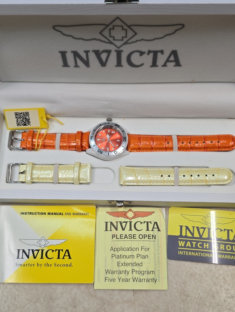 Invicta Women’s Orange Ceramic Dial Watch with Orange Or Cream Straps